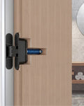 Bisagra oculta AGB Eclipse 3.2 HD Self negra con muelle de autocierre de 40 kg montada en puerta